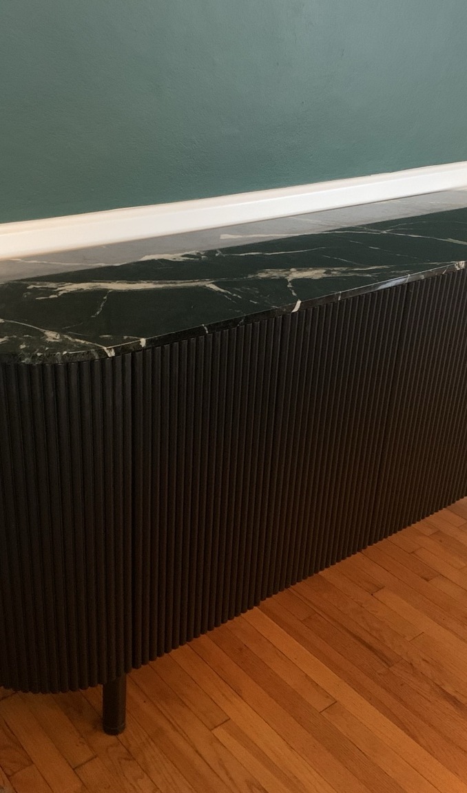 Black fluted credenza with stone top
